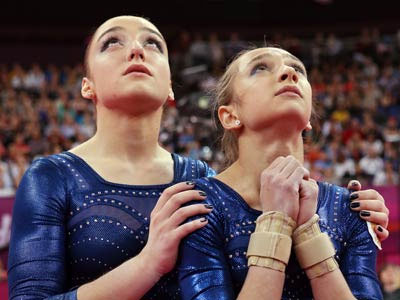 Серебро Комовой и бронза Мустафиной в спортивной гимнастике.